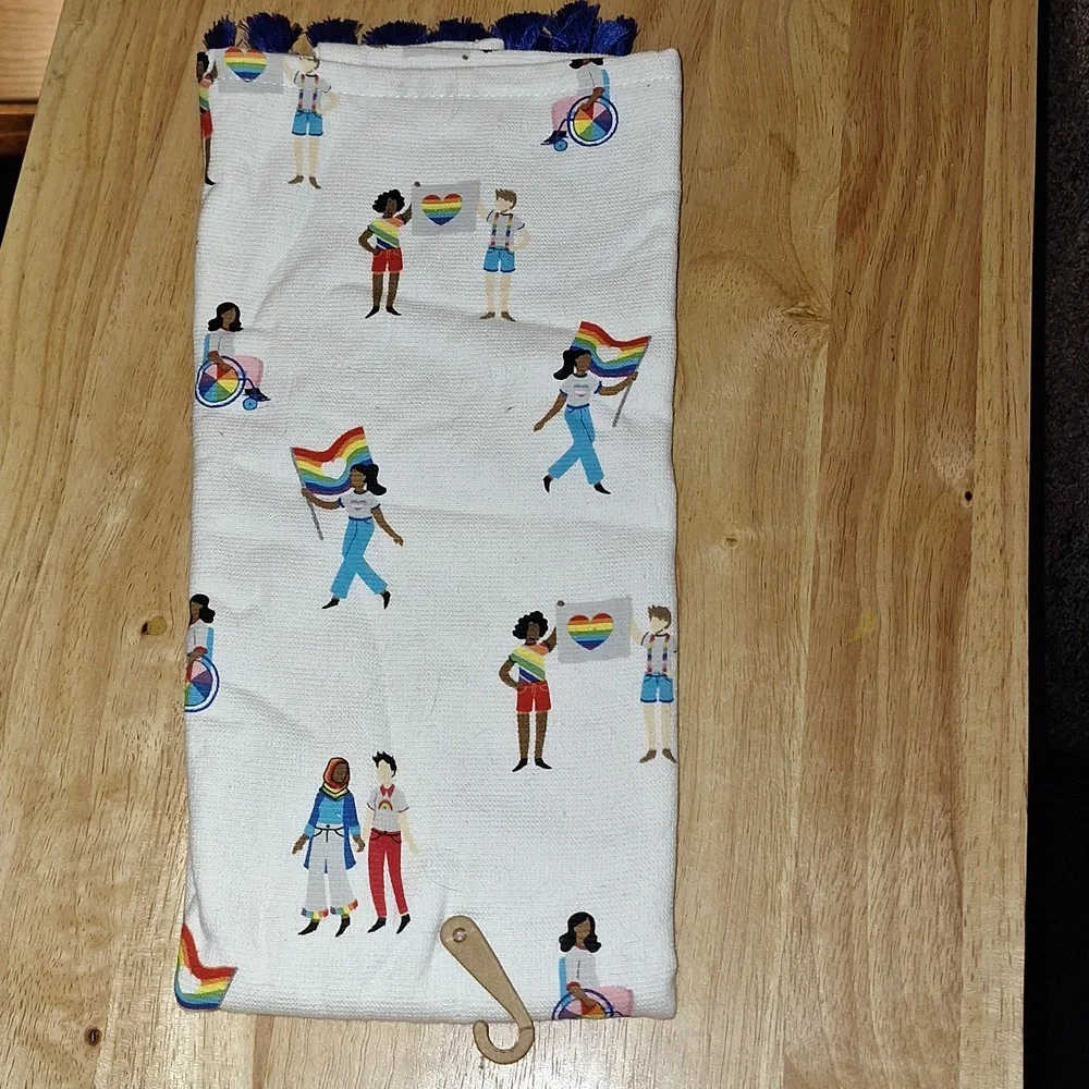 New Pride Human kitchen towel with blue tassel accents